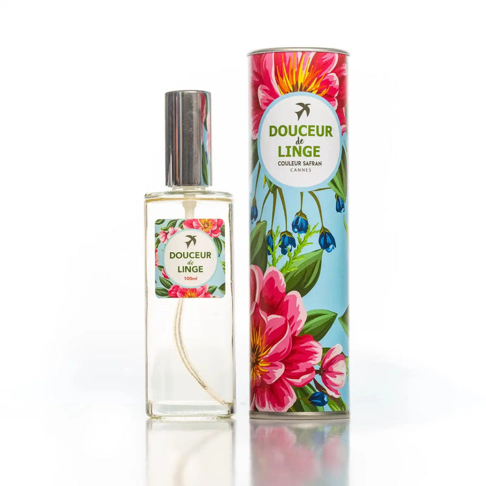 Flacon de 100ml de douceur de linge My Store, liquide parfumé pour le linge, avec une étiquette colorée et un bouchon blanc.